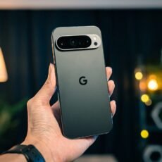 A person holding a cell phone in their hand